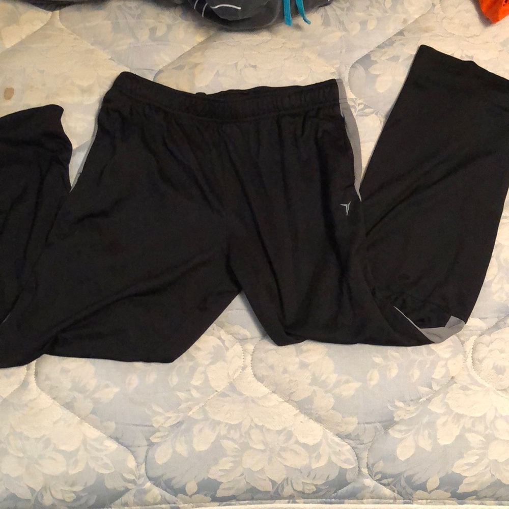 Dry fit pants with a grey stripe down the sides